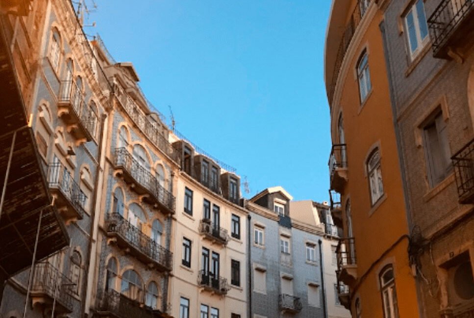Buildings in Lisbon, Portugal, as seen from the sidewalk.