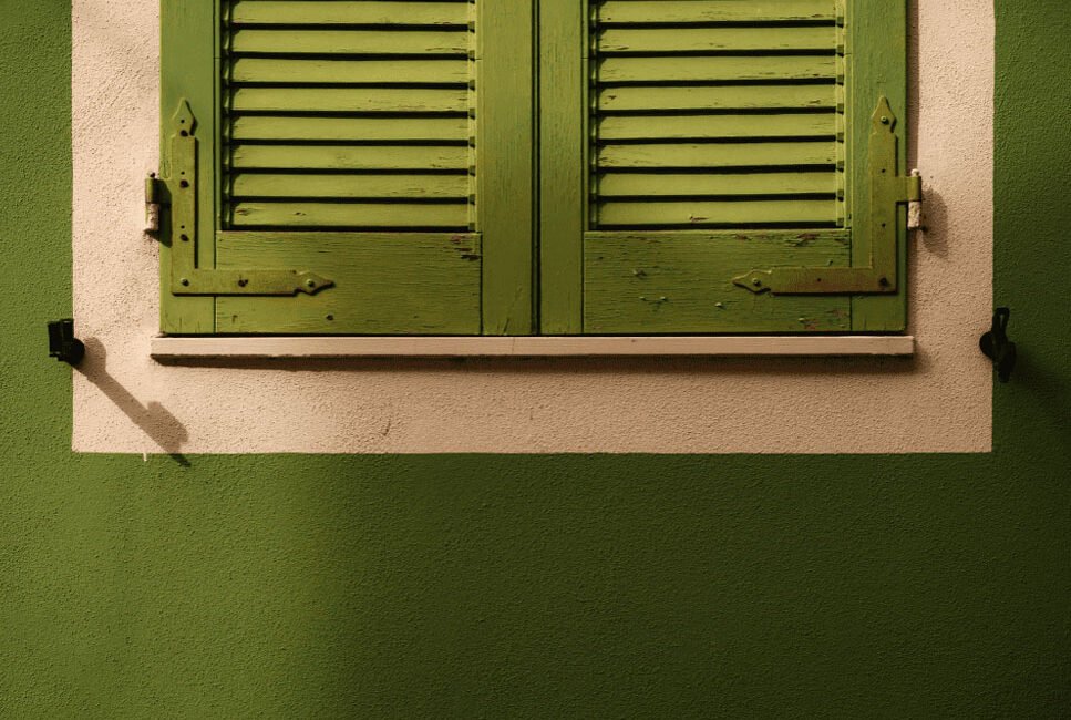 Window with green covers